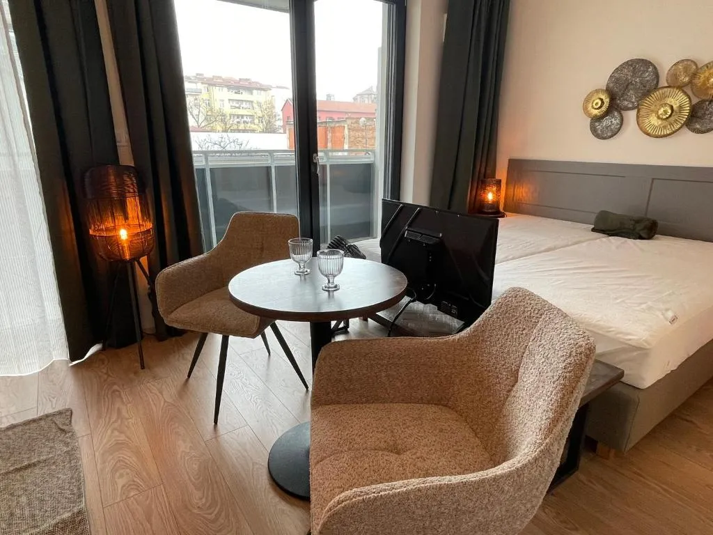 Apartmánem s balkonem — foto 1